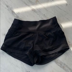 Lululemon black shorts with mesh strip